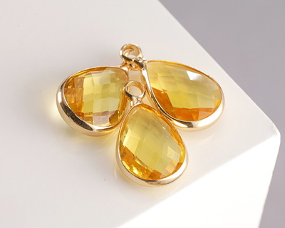 Yellow Crystal Teardrop in Gold Finish Bezel 10.5x18mm