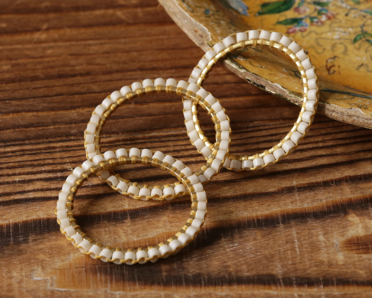 White Miyuki Delicas Woven on Gold (plated) Stainless Steel Ring 23mm