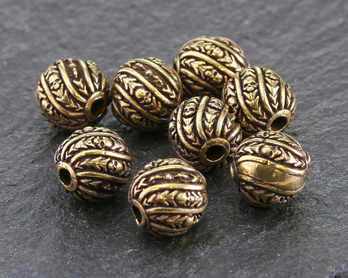 Antique Solid Brass Swirling Skulls Round 10mm