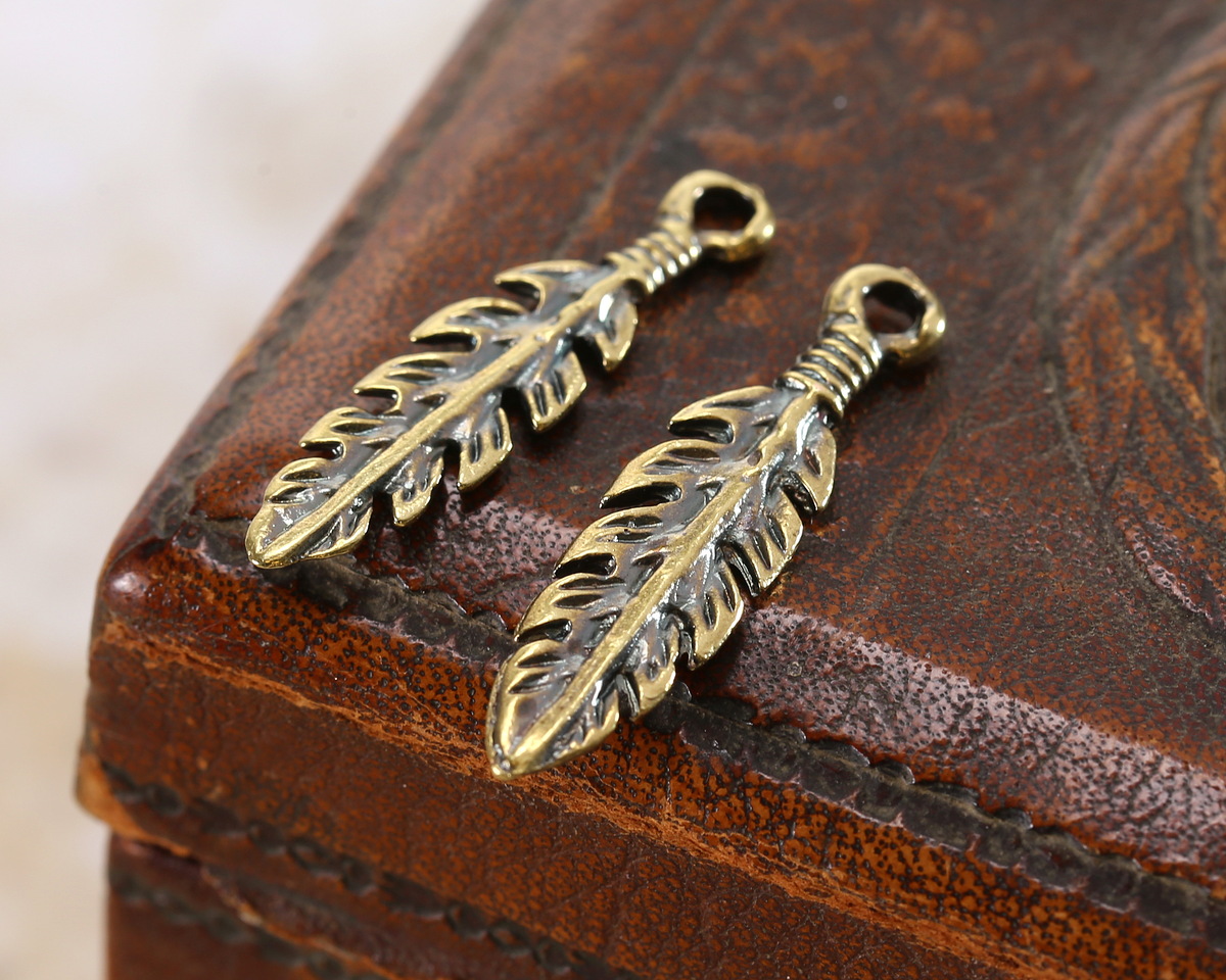 Mykonos Antique Brass (plated) Leafy Feather Charm 7x26mm