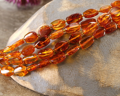 Red Amber (A) Irregular Flat Oval 6-7x8-10mm