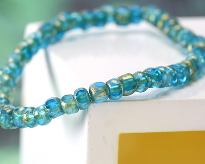 Czech Glass Aqua Blue w/ Antique Gold Trica Beads 3x4mm