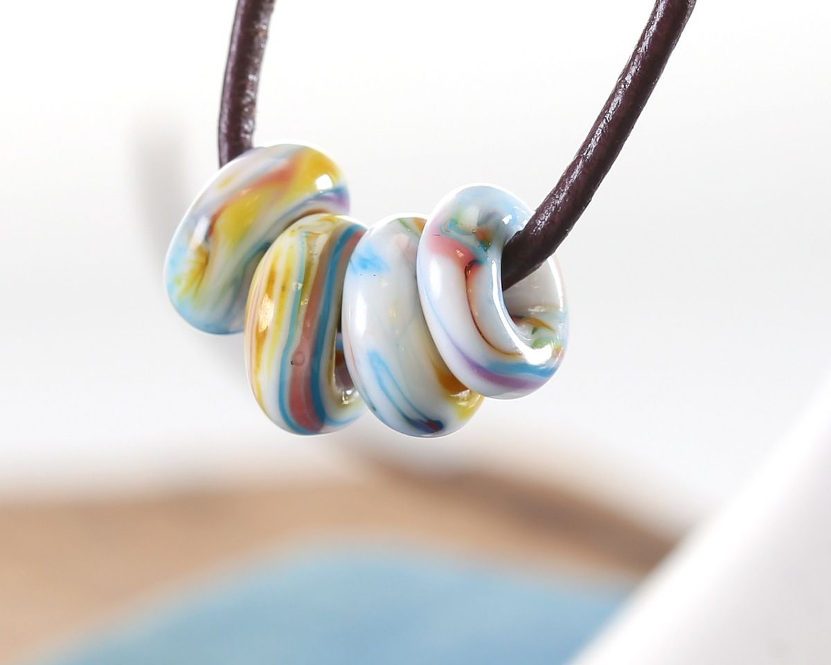 Unicorne Beads Glass Aspen Donut 4-6x9-11mm