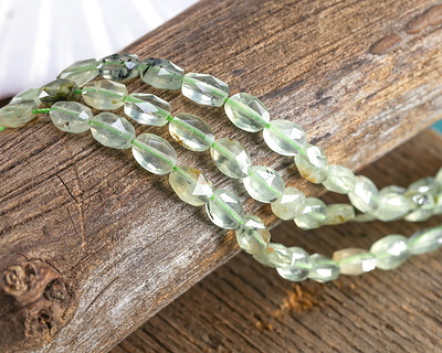 Prehnite (w/ Rutile) Microfaceted Oval 8x6mm