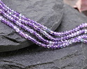 Purple Fluorite (AA) Microfaceted Round 2mm