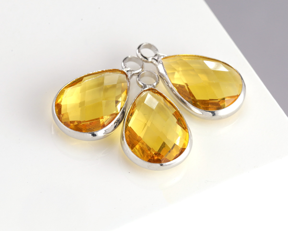 Yellow Crystal Teardrop in Silver Finish Bezel 10.5x18mm