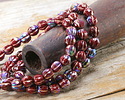 Czech Glass Dark Ruby AB w/ Copper Faceted Melon 6mm